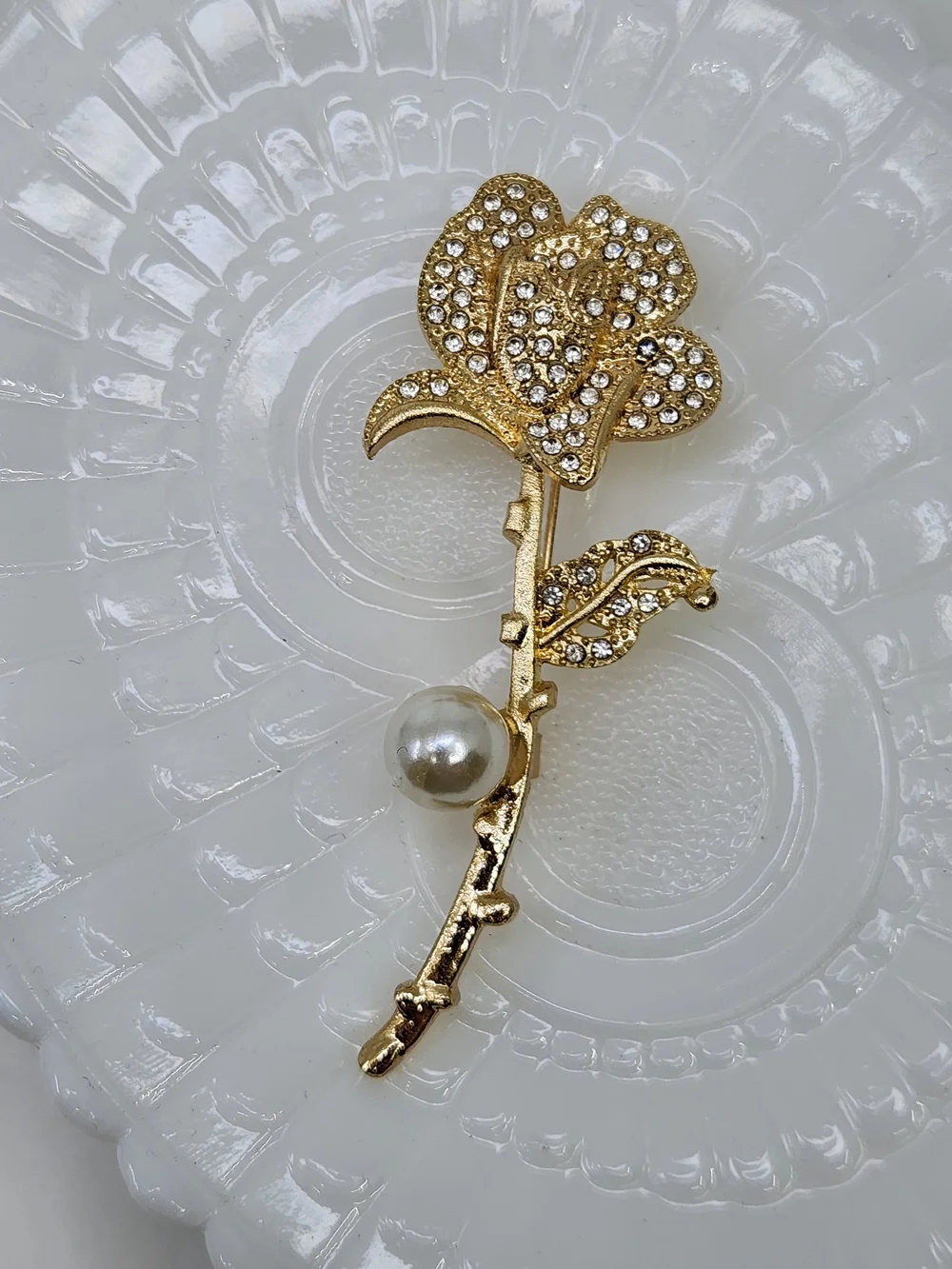Gold Tone Crystal Rose Brooch with Faux Pearl Accent
